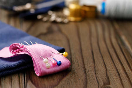 Close up of sewing accessories on tableの写真素材