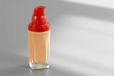 Make up cream foundation with red cap close upの写真素材