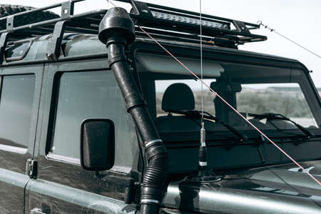 Closeup photo of off road car in mountainsの写真素材