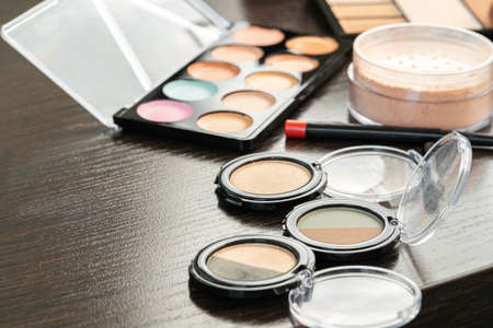 Set of eye shadows on grey background