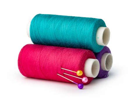 Color thread spool isolated on white background