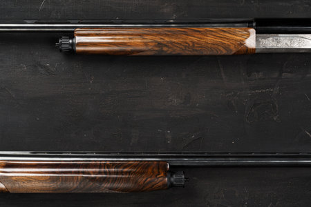 Smoothbore hunting gun on black background close up