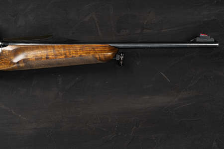 Smoothbore hunting gun on black background close upの写真素材