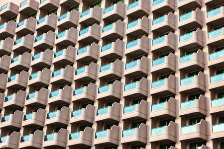 Balcony pattern. Residential building with identical glass balconiesの写真素材