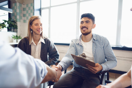 Young people sitting in a circle and having a discussion