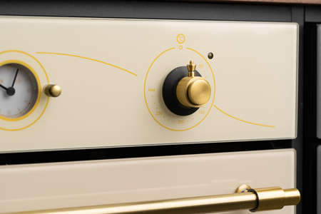 Modern oven mode control button close up