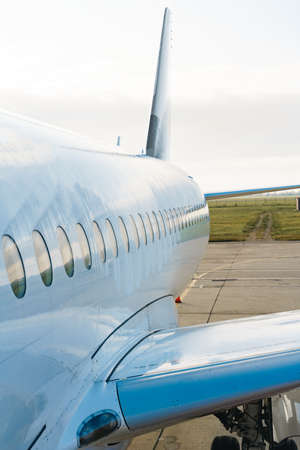 Close up of passenger airplane on the airport runway