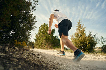 Close up of a man climbing the mountain