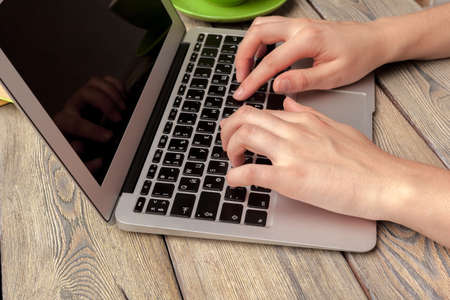 Laptop Coffee Cup Office Concept close up