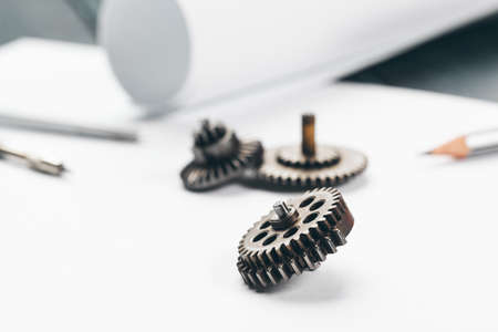 Engineering supplies and blueprints on workplace close upの写真素材