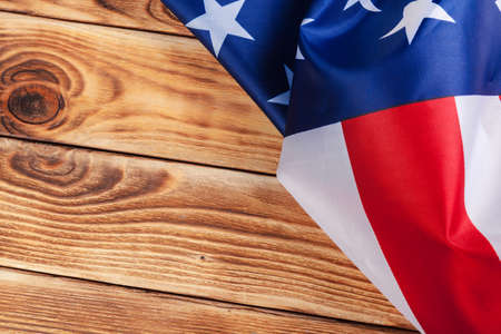 USA flag on light wooden table background close up copy spaceの写真素材