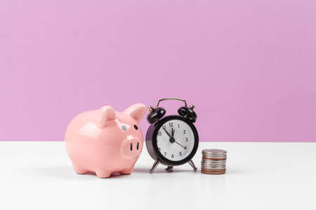 piggy bank with coin on the table