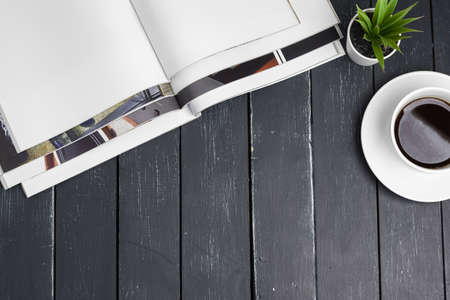 Close up stacking magazine place on table backgroundの写真素材