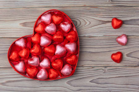 Candy Hearts on wood , valentines day.の写真素材