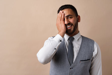 Close up portrait of young arab man in studio