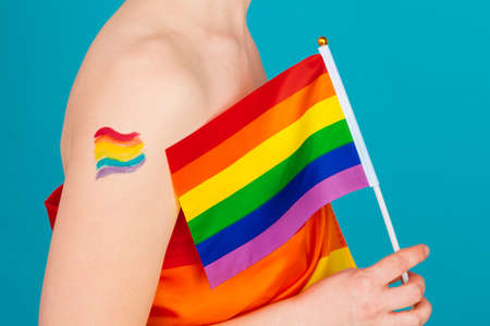 young woman covering with lgbt pride flag