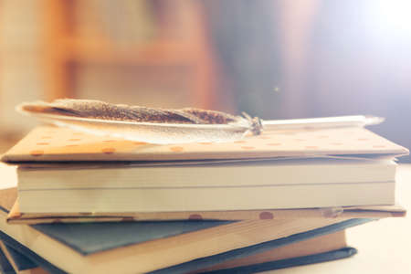 Stack of books on the tableの写真素材