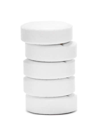 Medical pill tablet isolated on whiteの写真素材