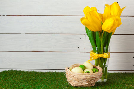 Easter Eggs with flower on Green Grass
