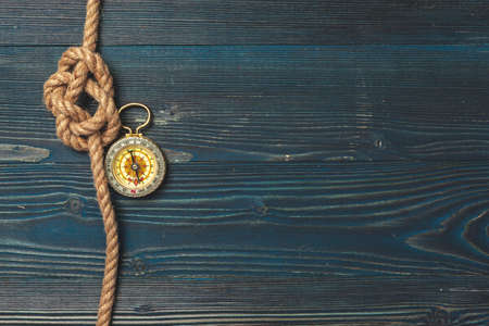 Nautical background. Sailing rope with a compassの写真素材