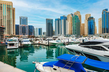 Dubai Marina skyscrapers and port in Dubai, United Arab Emiratesの写真素材