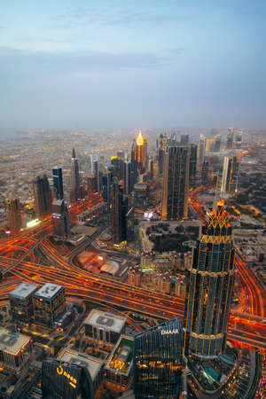 DUBAI, UAE - MARCH, 2021: At the top of Burj Khalifa, cityscape of Dubai
