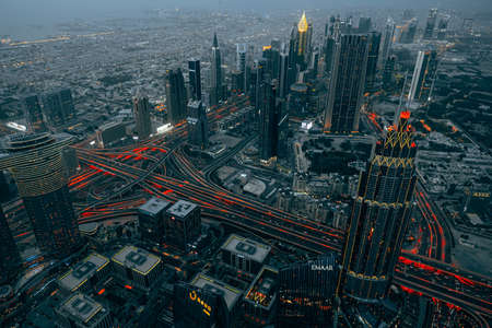 DUBAI, UAE - MARCH, 2021: At the top of Burj Khalifa, cityscape of Dubai