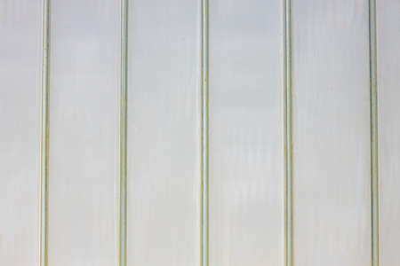 Gray textured metal urban wall for backgroundの写真素材