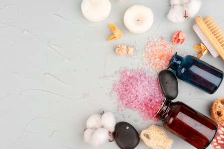 Beautiful composition with cosmetic bottles and spa decorations
