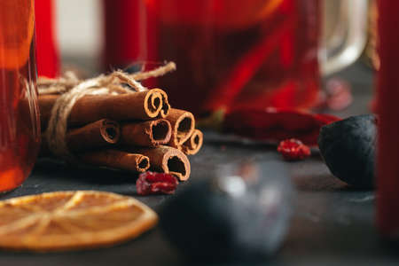 Fig half, cinnamon sticks and dried orange slice close upの写真素材