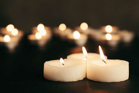 Many burning candles with shallow depth of fieldの写真素材