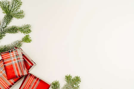 Top view, flat lay of red Christmas gifts on white backgroundの写真素材