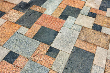 Street floor textured tiles as a backgroundの写真素材