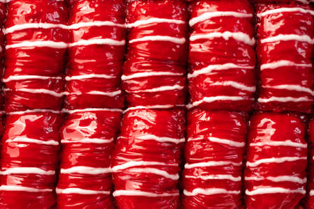 Red colored Turkish dessert baklava placed in rowsの写真素材