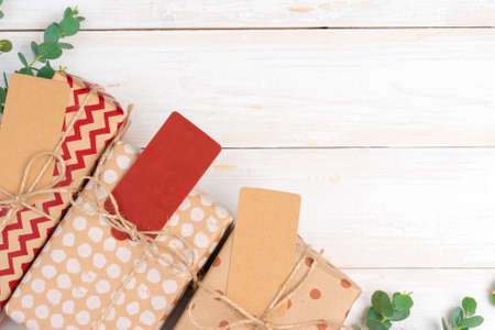 Christmas present with greeting card close upの写真素材
