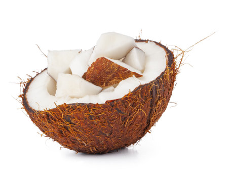 Coco nut halves isolated on white backgroundの写真素材