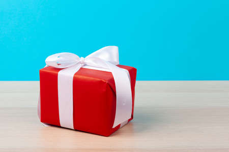 Decorated gift boxes on light blue backgroundの写真素材