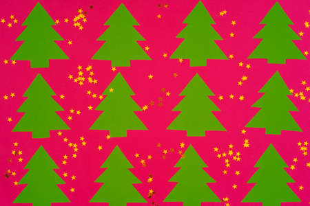 Pink background with Christmas holiday decorations pattern