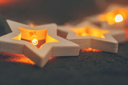 Star-shaped light garlands, festive decoration for Christmasの写真素材