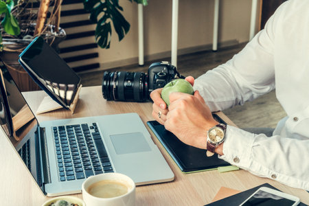Working table of a photographer close upの写真素材