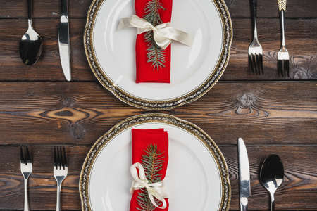 Festive table setting for Christmas dinner, top viewの写真素材