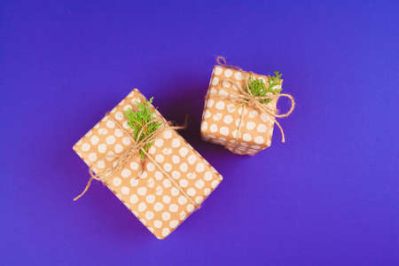 Gift box on purple background top viewの写真素材
