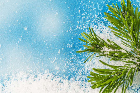 Winter icy blue background with snow, copy space