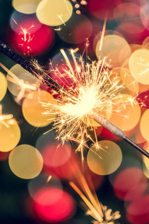 Bengal sparkle lights close up on dark backgroundの写真素材