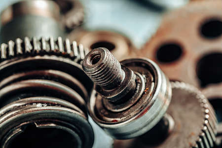 Close up of old rusty car parts on dark backgroundの写真素材