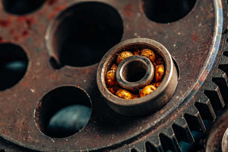 Close up of old rusty car parts on dark backgroundの写真素材