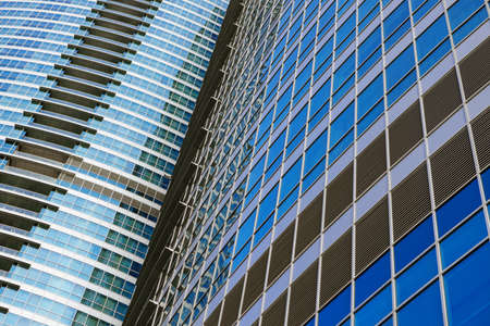 Modern office building with glass facade for backgroundの写真素材