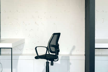 Morning in coworking. Contemporary office interior with furnitureの写真素材