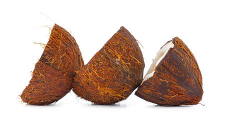 Coco nut halves isolated on white backgroundの写真素材