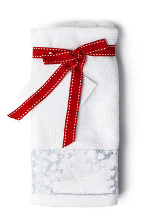 Soft folded towel isolated on white backgroundの写真素材